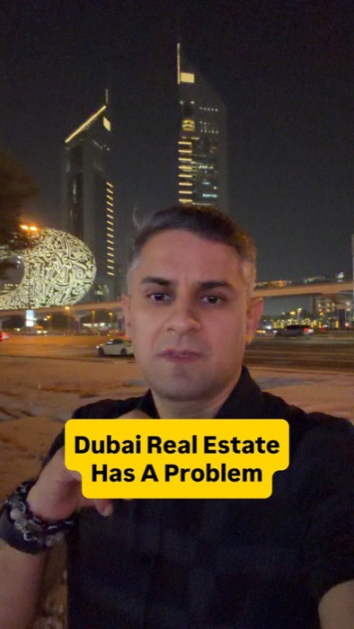 Bharat Khanna outdoors at night with the Dubai skyline behind him, on-screen text 'Dubai Real Estate Has A Problem'